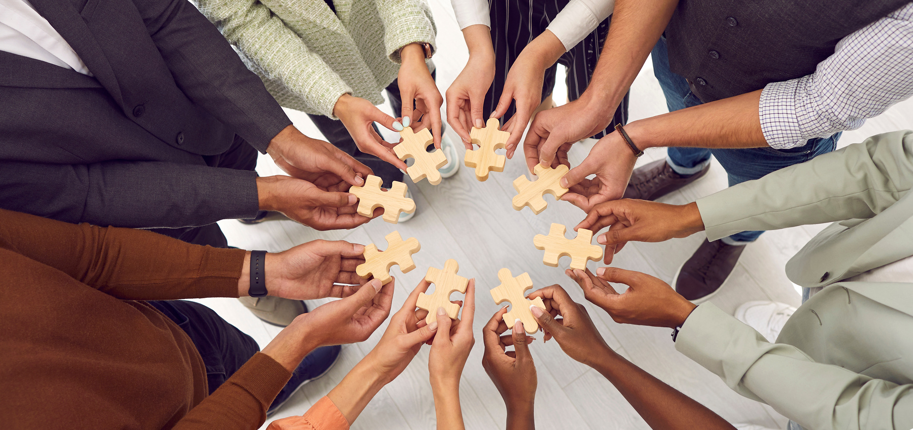 Banner with Team of Business People Standing Together and Joining Pieces of Jigsaw Puzzle